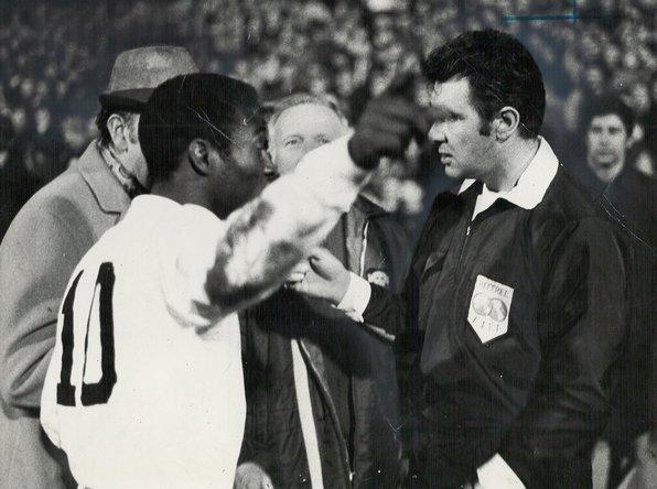 Pele reminds the ref at Villa Park, jthat he's just given a freekick against the God of Football