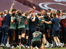 Aston Villa team celebrate survival