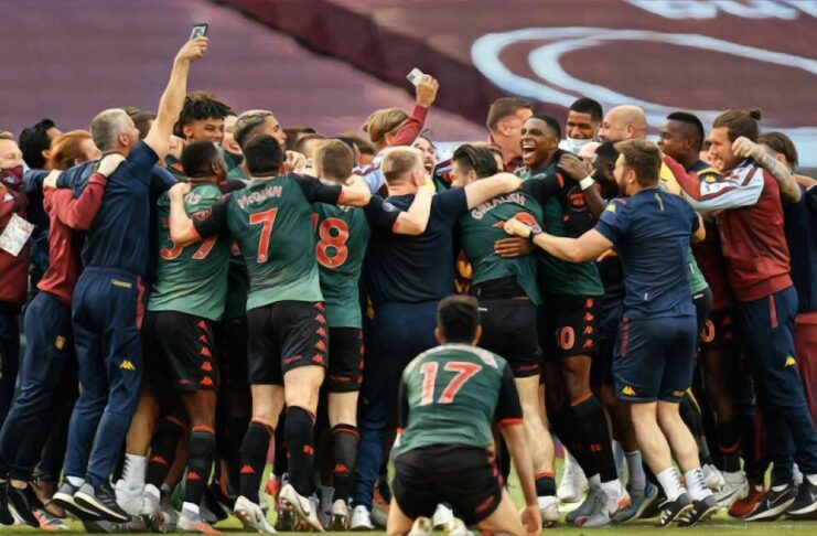 Aston Villa team celebrate survival